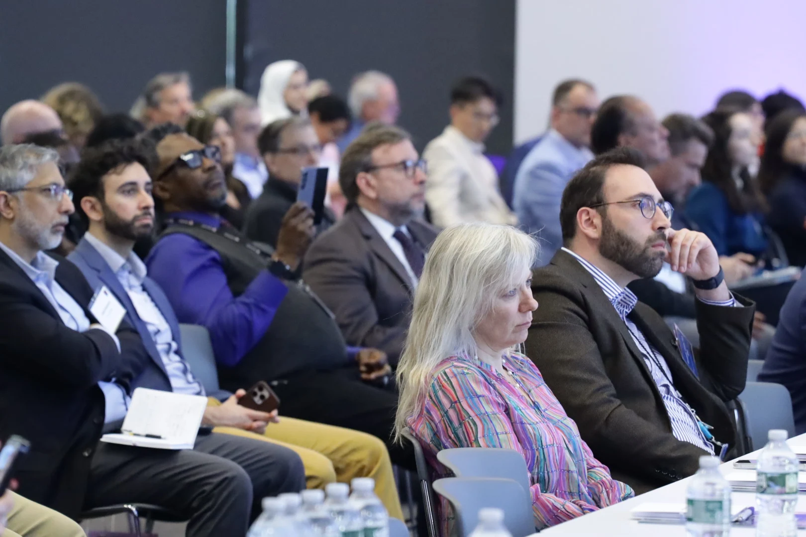 An audience listening to a MESH Core presentation.
